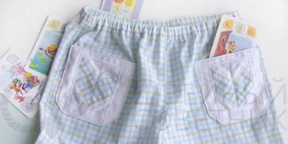 Детские шорты с накладными карманами в стиле «пэчворк»